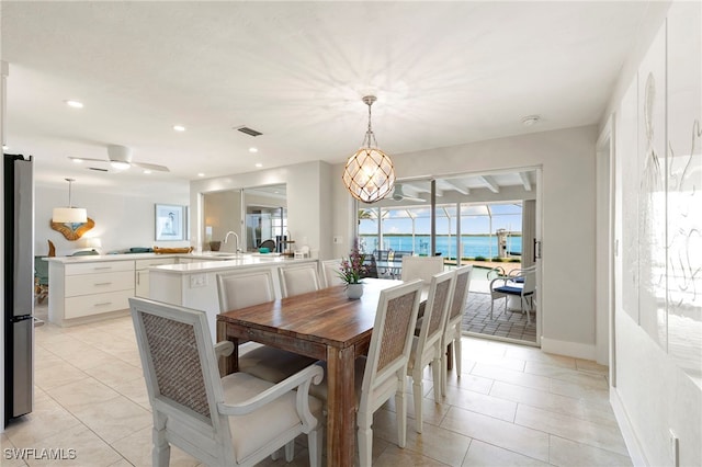 dining room featuring recessed lighting, visible vents, baseboards, and light tile patterned flooring