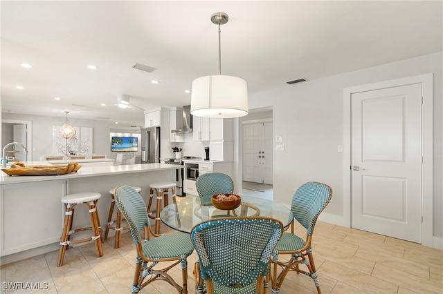 dining area with visible vents and recessed lighting