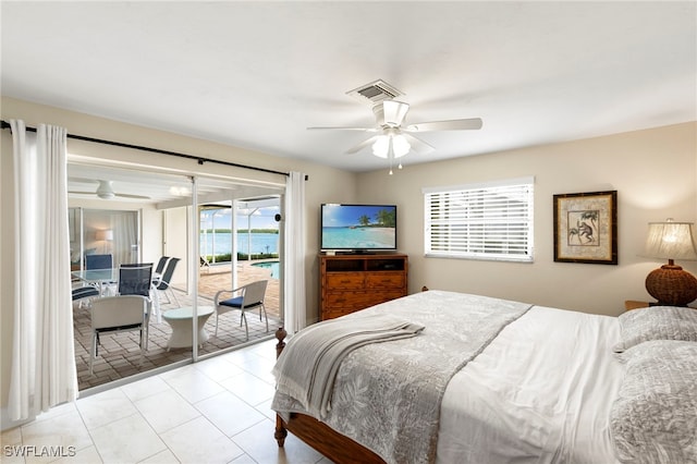 bedroom with access to outside, visible vents, and ceiling fan