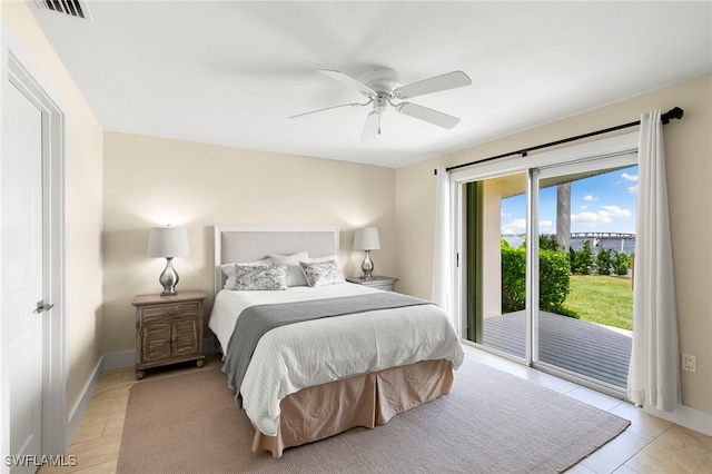 bedroom with access to exterior, light tile patterned floors, visible vents, a ceiling fan, and baseboards