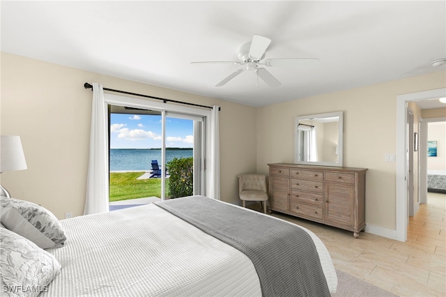 bedroom with access to exterior, baseboards, and a ceiling fan