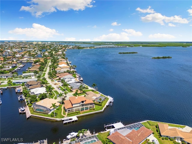 bird's eye view with a water view and a residential view