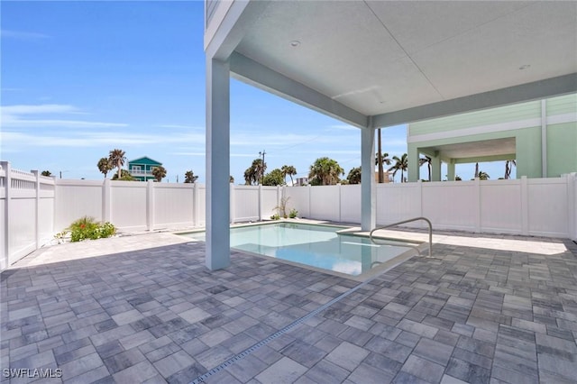 view of pool featuring a fenced in pool, a fenced backyard, and a patio