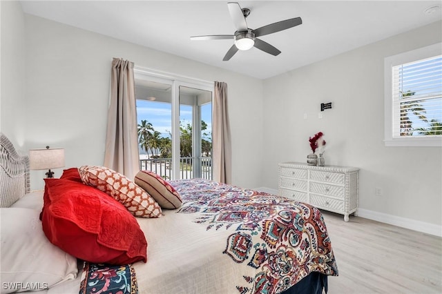 bedroom featuring light wood-style floors, access to outside, baseboards, and a ceiling fan