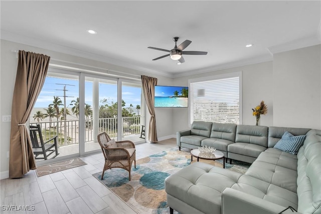 living room featuring recessed lighting, crown molding, baseboards, and ceiling fan