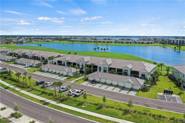 aerial view featuring a water view and a residential view