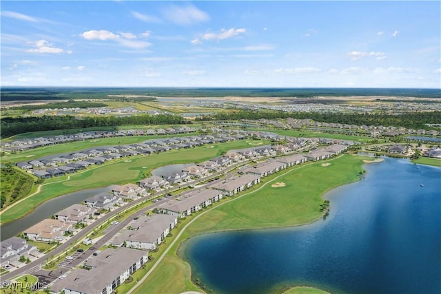 bird's eye view featuring a water view, a residential view, and golf course view