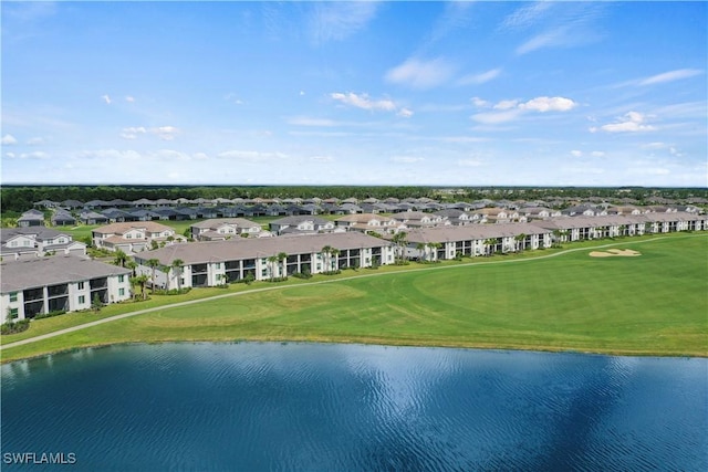 bird's eye view with a residential view and a water view