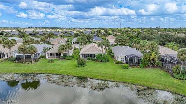 bird's eye view with a water view