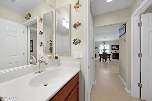 bathroom with vanity and tile patterned floors