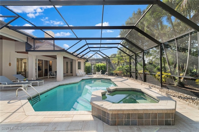 view of pool featuring a lanai, an in ground hot tub, and a patio