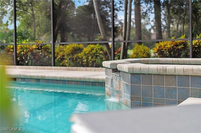 view of pool featuring pool water feature