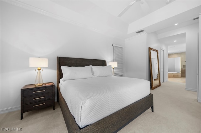 carpeted bedroom featuring ensuite bathroom, ceiling fan, and crown molding