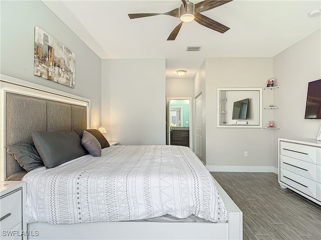 bedroom with wood-type flooring and ceiling fan