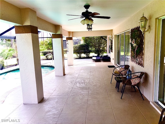 view of patio with ceiling fan