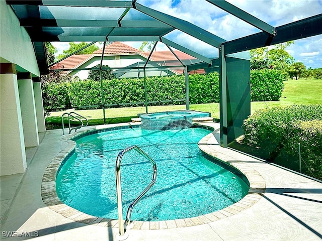 view of pool with a lanai and an in ground hot tub