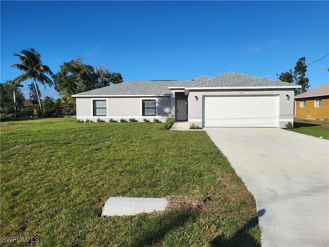 ranch-style house with a garage and a front lawn