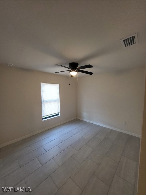 empty room featuring ceiling fan