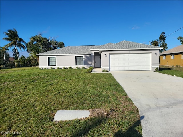 single story home with a front yard and a garage