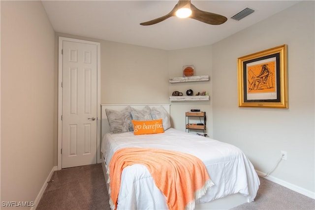 bedroom with carpet floors, a ceiling fan, visible vents, and baseboards