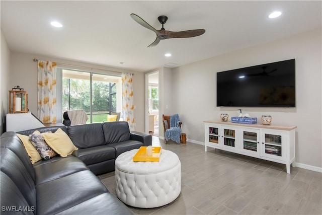 living room with recessed lighting, ceiling fan, baseboards, and wood finished floors