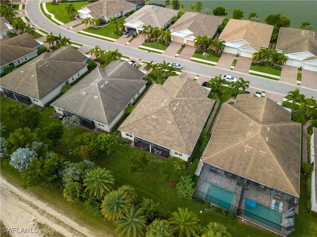 birds eye view of property with a residential view