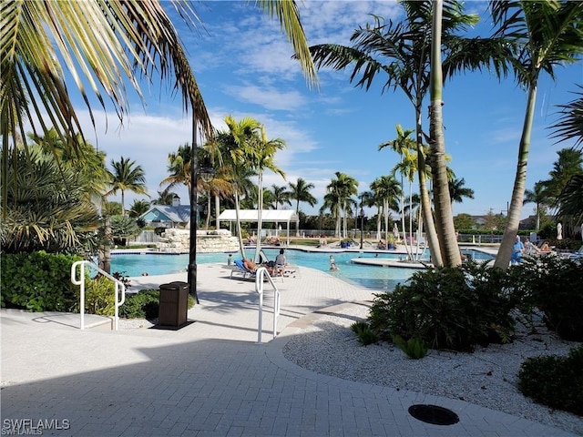 community pool featuring a patio