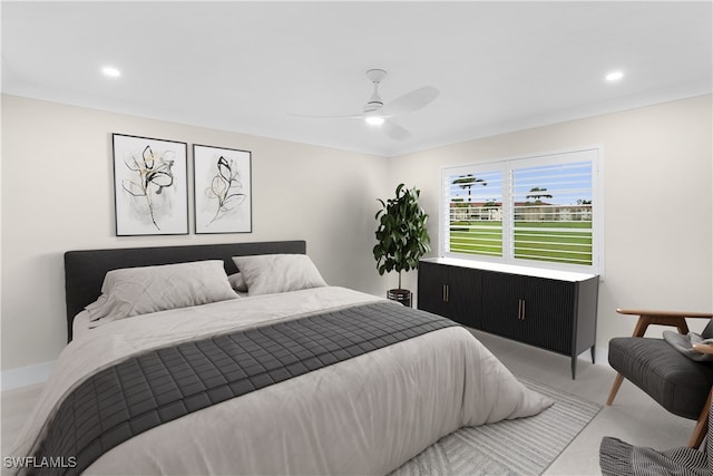 bedroom with crown molding, recessed lighting, light colored carpet, ceiling fan, and baseboards