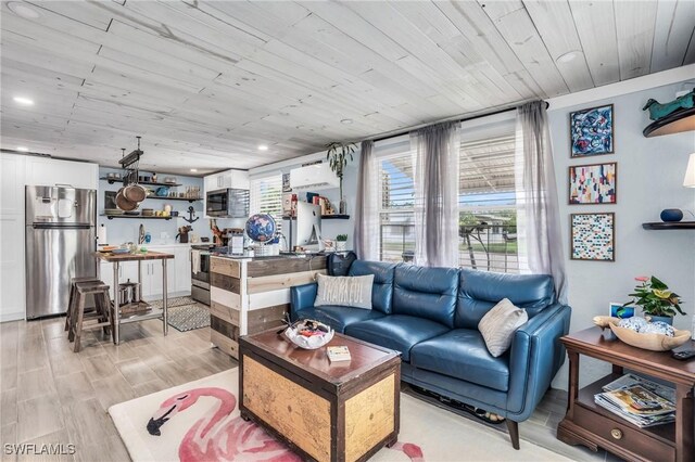 living room featuring light hardwood / wood-style flooring and wooden ceiling