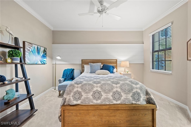 bedroom with carpet, ceiling fan, and crown molding