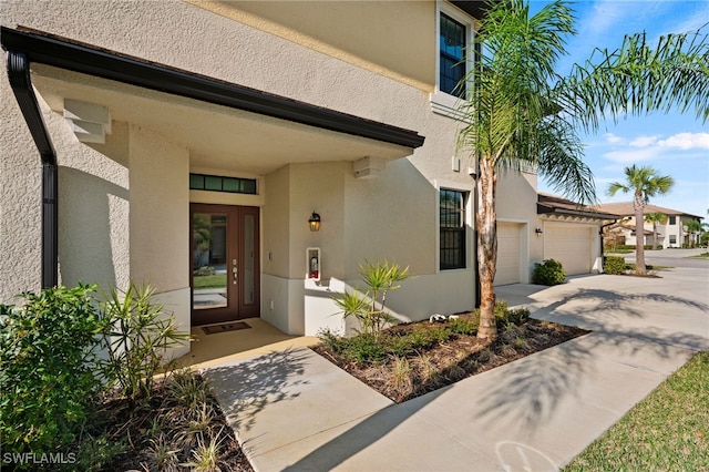 doorway to property featuring a garage