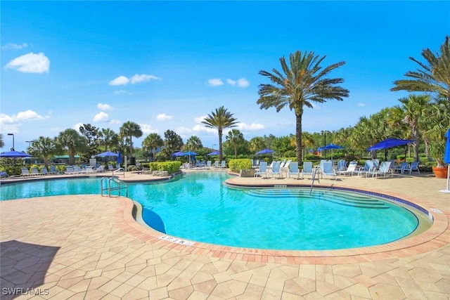 pool with a patio