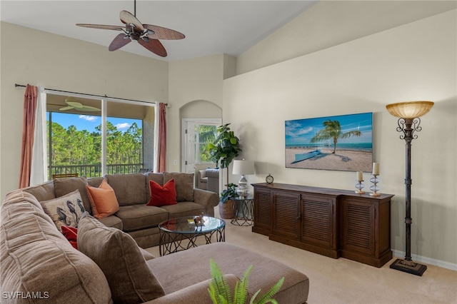 living room featuring carpet floors, ceiling fan, and baseboards