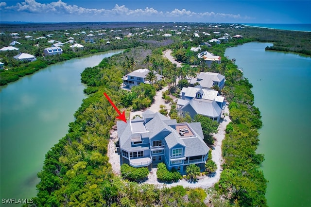 aerial view featuring a water view