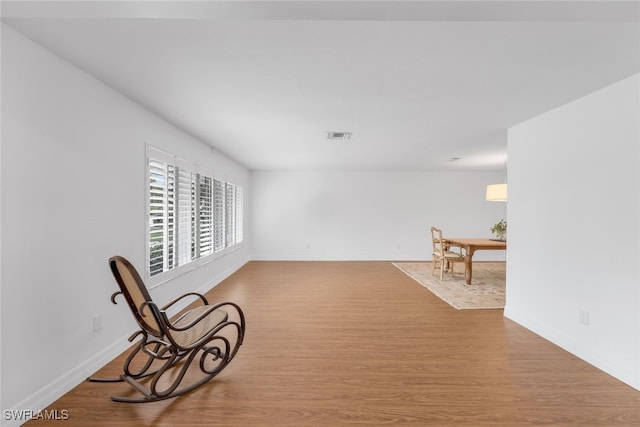 unfurnished room featuring light hardwood / wood-style floors