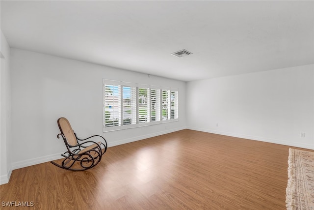 unfurnished room featuring light wood-type flooring