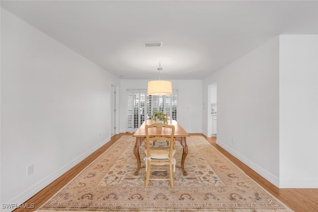 dining area featuring light hardwood / wood-style floors