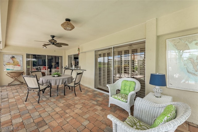 view of patio with ceiling fan