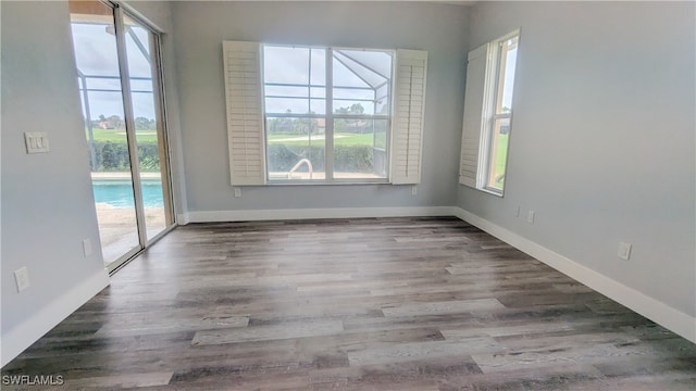 empty room featuring hardwood / wood-style floors