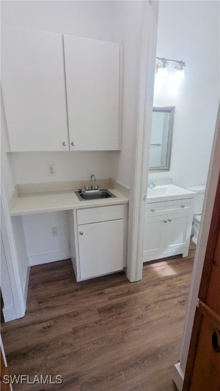 bathroom featuring vanity and hardwood / wood-style floors