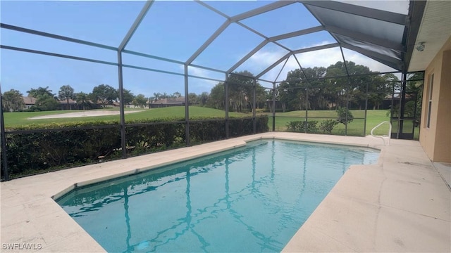 6733 Bent Grass Dr, Naples, FL 34113 - pool featuring glass enclosure, a lawn, and a patio area