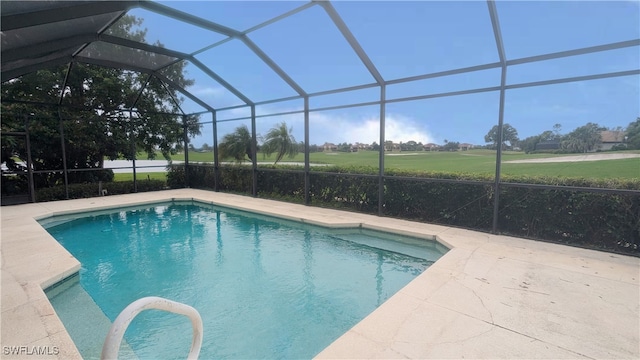 view of pool featuring a lanai and a patio area