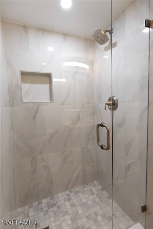 full bathroom with a stall shower