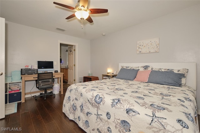 bedroom with ceiling fan and dark hardwood / wood-style floors