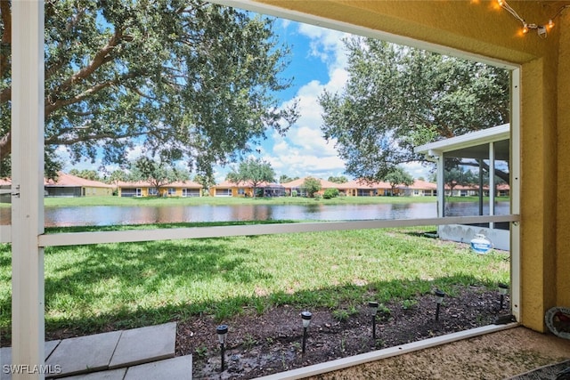 view of yard featuring a water view