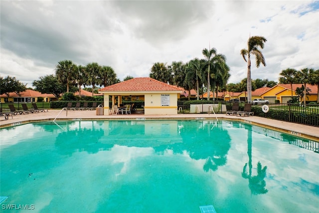 view of swimming pool with a patio area