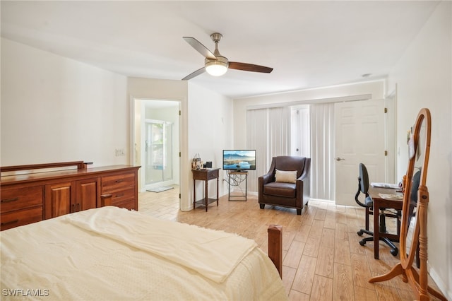 bedroom with light wood-type flooring and ceiling fan