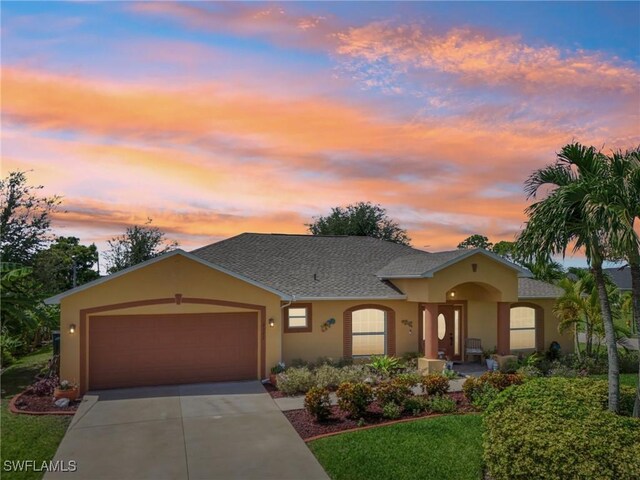 view of front of home featuring a garage