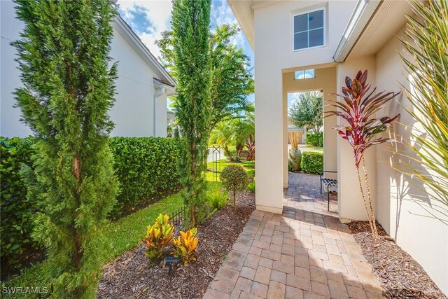 14151 Nautica Ct, Naples, FL 34114 - entrance to property with stucco siding