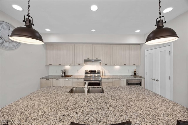 14151 Nautica Ct, Naples, FL 34114 - kitchen featuring recessed lighting, under cabinet range hood, a sink, electric stove, and decorative backsplash